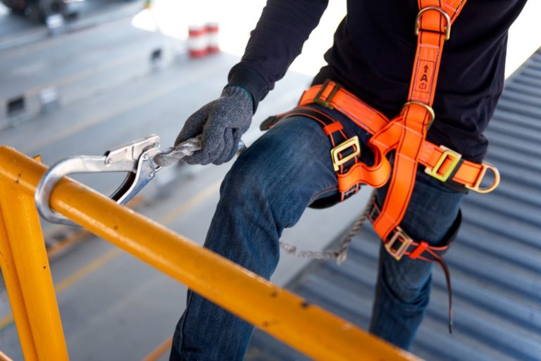 construction-worker-use-safety-harness-and-safety-line-working-on-a-new-construction-site-project