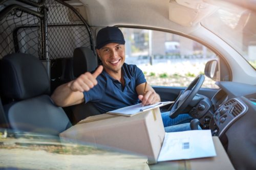 delivery-man-sitting-in-a-delivery-van