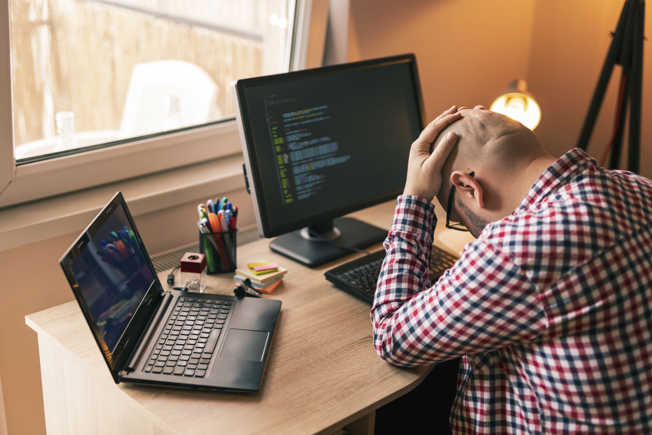 Software developer stressed out at work