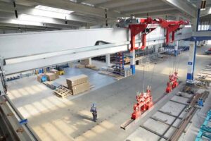a man standing in a large warehouse